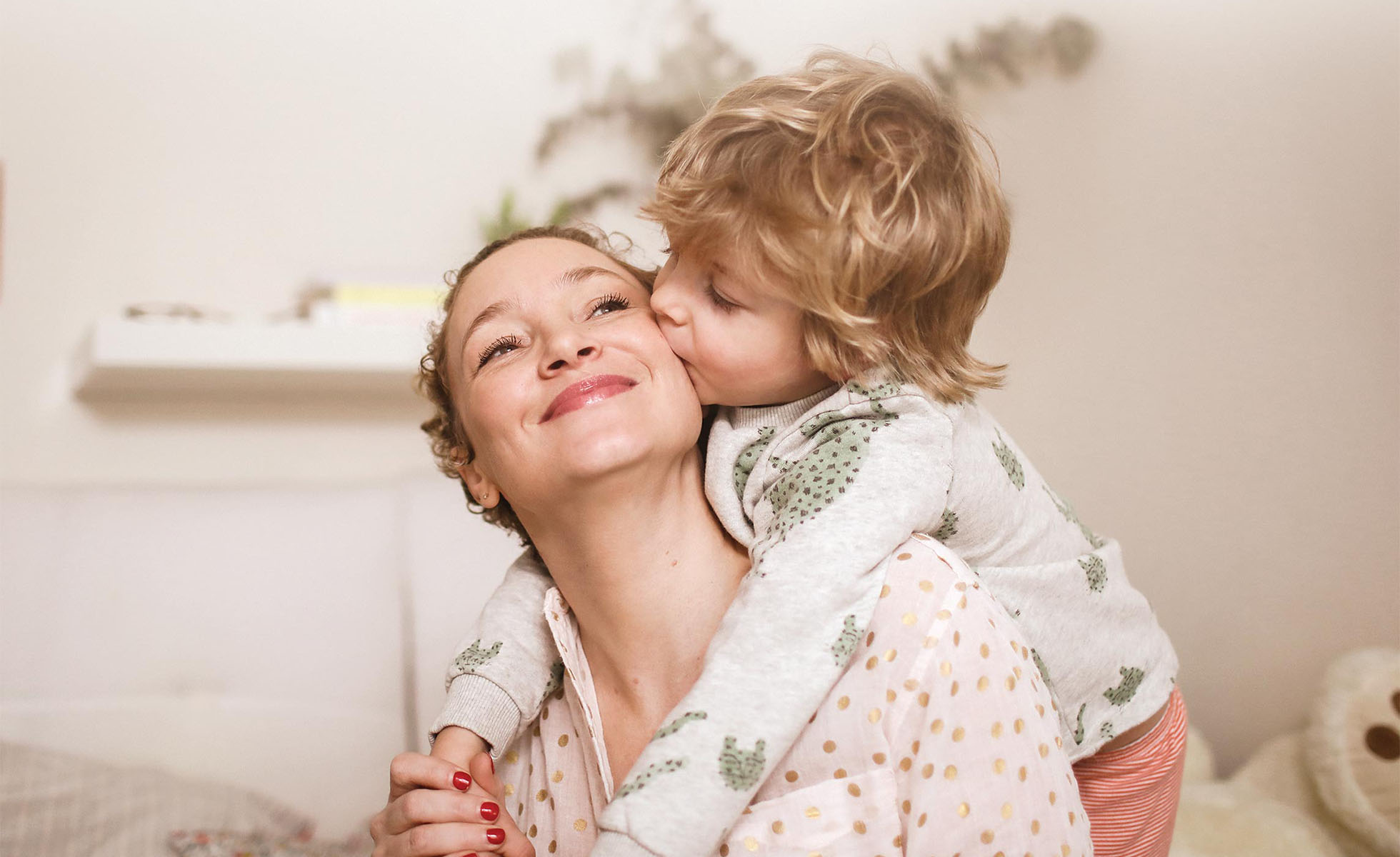 mom hugging her son