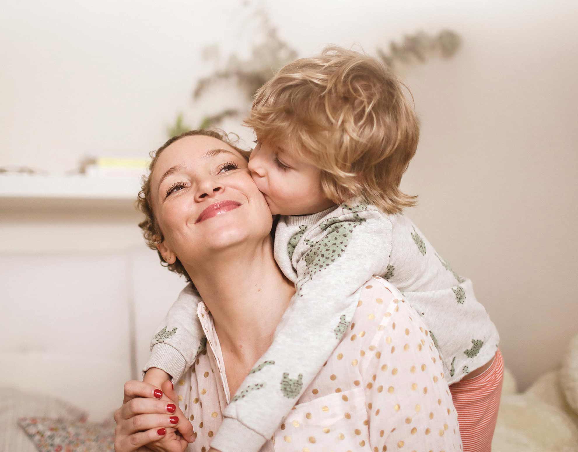 mom and son hugging