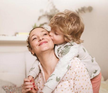 woman and son embrace