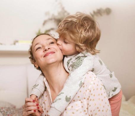 woman and son embrace